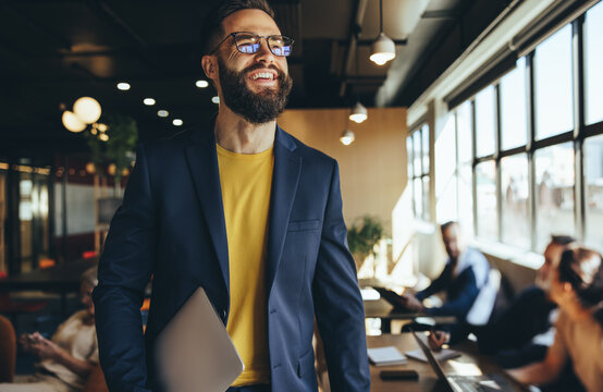 Happy BPO manager smiling in a co-working space.