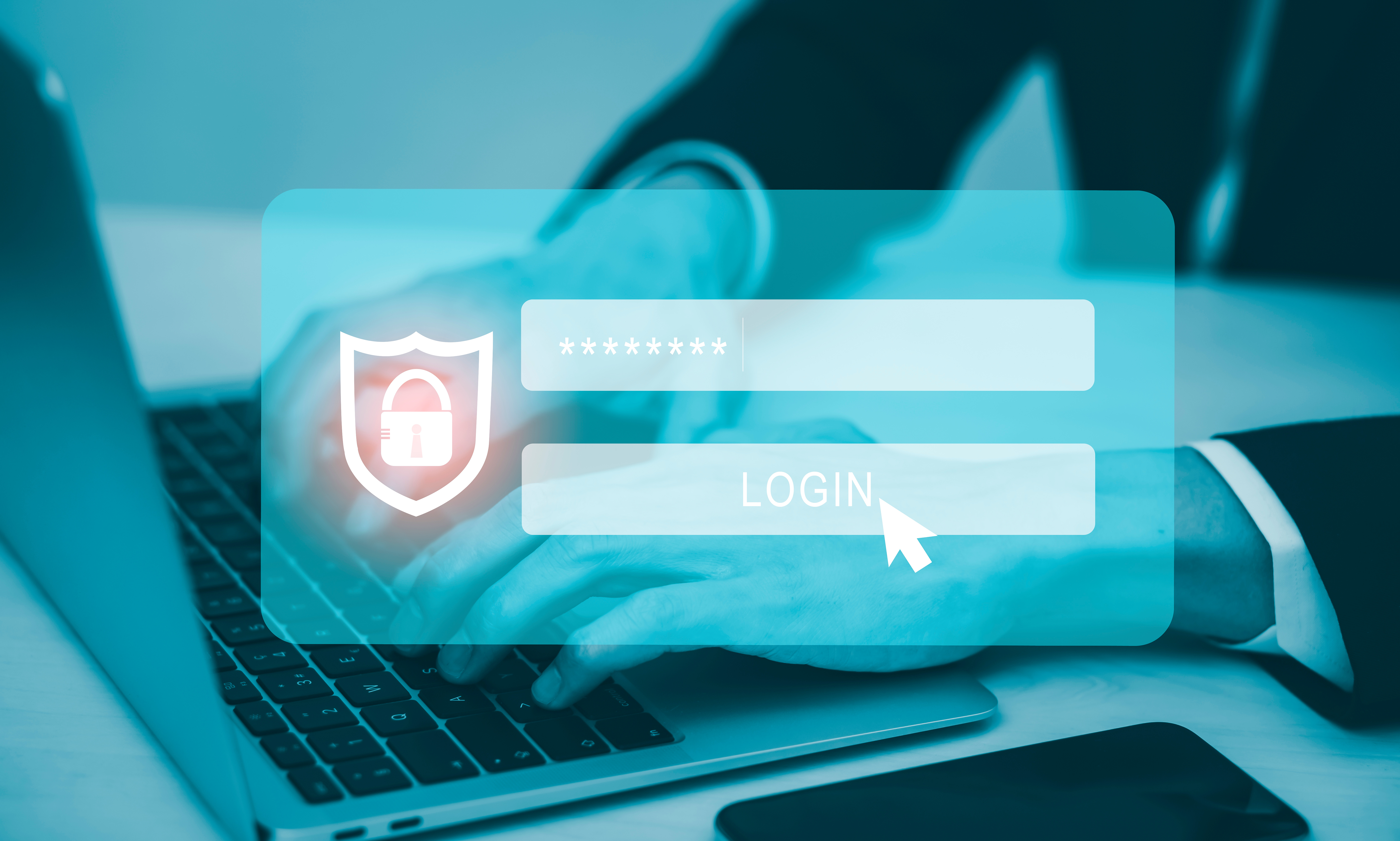 Login screen overlaid on a person typing on a keyboard.